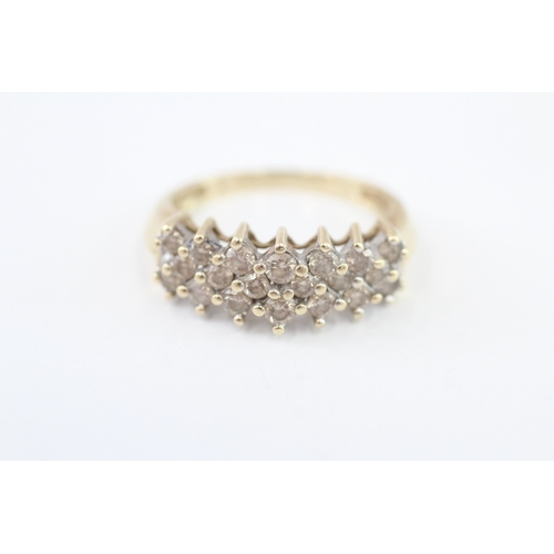253 - 14ct gold diamond dress ring (4.9g) Size R