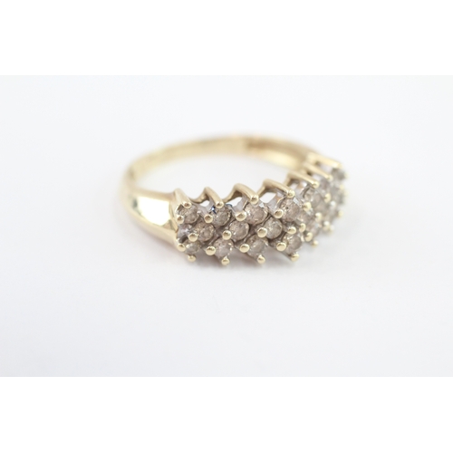 253 - 14ct gold diamond dress ring (4.9g) Size R