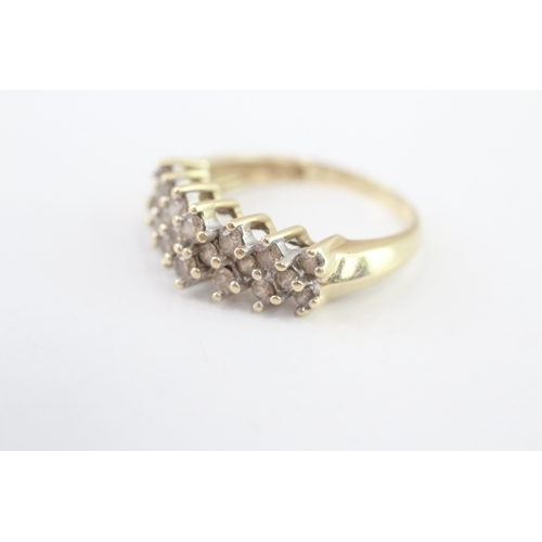 253 - 14ct gold diamond dress ring (4.9g) Size R