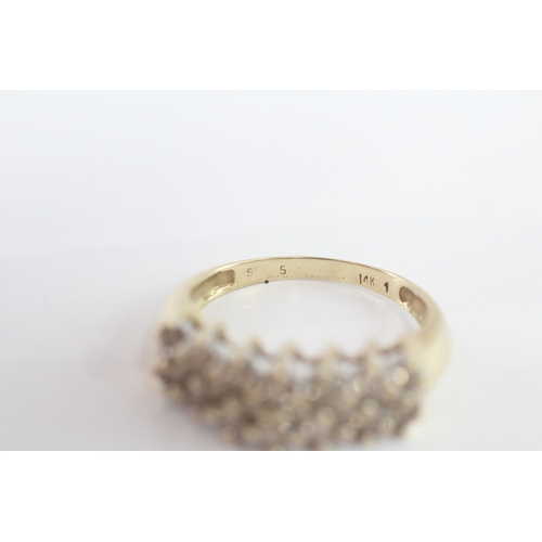 253 - 14ct gold diamond dress ring (4.9g) Size R