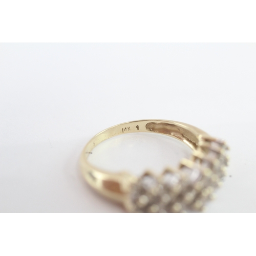 253 - 14ct gold diamond dress ring (4.9g) Size R