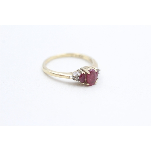 255 - 9ct gold ruby & diamond dress ring (2.1g) Size O
