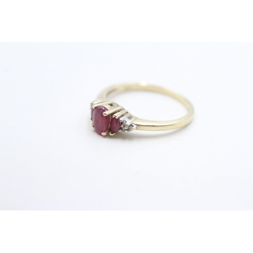 255 - 9ct gold ruby & diamond dress ring (2.1g) Size O
