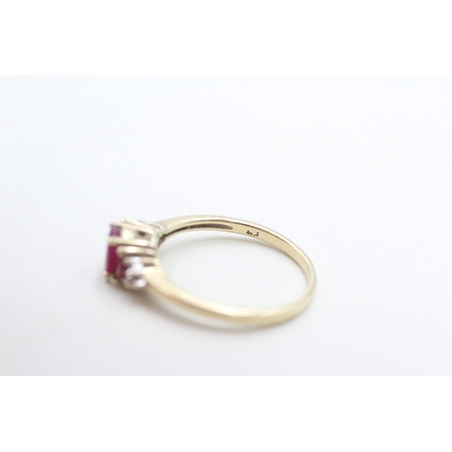 255 - 9ct gold ruby & diamond dress ring (2.1g) Size O