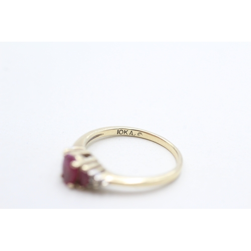255 - 9ct gold ruby & diamond dress ring (2.1g) Size O