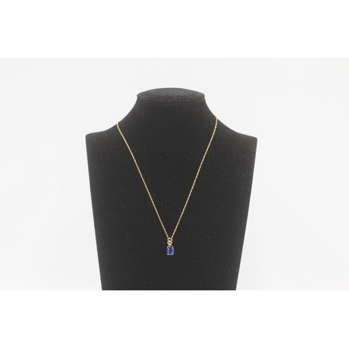 257 - 9ct gold kyanite & diamond pendant necklace (1.8g)