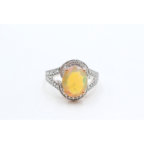 261 - 9ct gold opal & diamond dress ring (3.2g) Size P