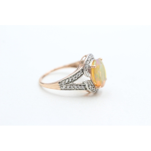 261 - 9ct gold opal & diamond dress ring (3.2g) Size P
