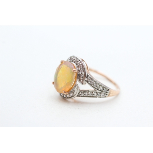 261 - 9ct gold opal & diamond dress ring (3.2g) Size P