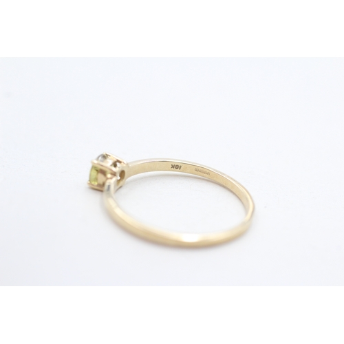 264 - 9ct gold yellow gemstone solitaire ring (1.2g) Size N 1/2