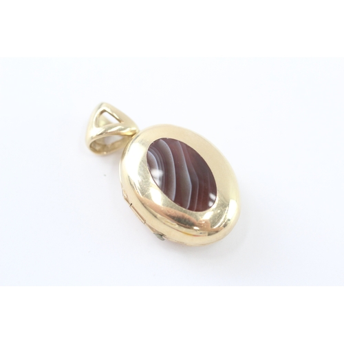 268 - 9ct gold agate locket (8.4g)