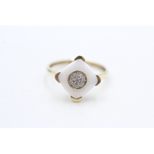 272 - 9ct gold diamond dress ring (2.4g) Size P
