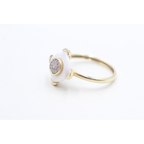 272 - 9ct gold diamond dress ring (2.4g) Size P