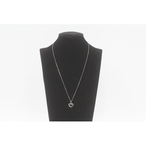 273 - 9ct gold black gemstone & diamond heart shape pendant necklace (1.7g)