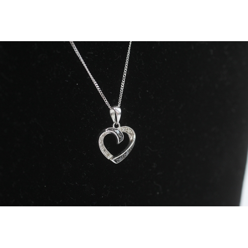 273 - 9ct gold black gemstone & diamond heart shape pendant necklace (1.7g)