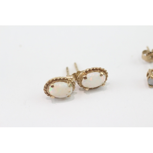 274 - 2 x 9ct gold opal stud earrings (1.9g)