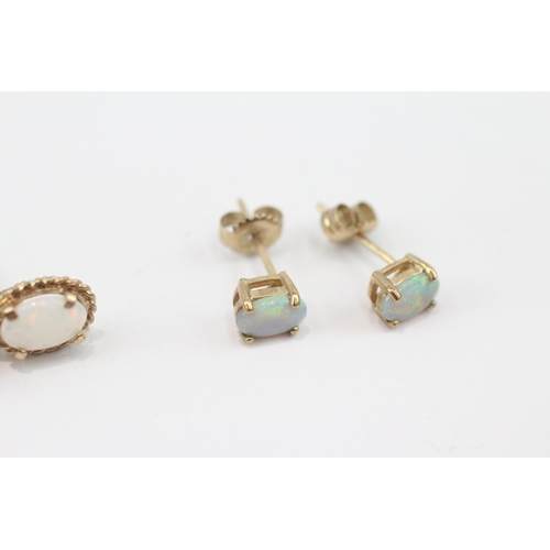 274 - 2 x 9ct gold opal stud earrings (1.9g)