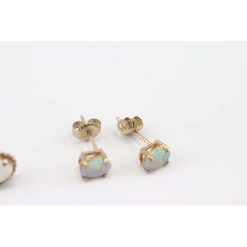 274 - 2 x 9ct gold opal stud earrings (1.9g)