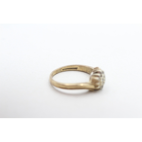 277 - 9ct gold diamond cluster ring (2.7g) Size K