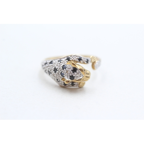 281 - 9ct gold sapphire & diamond leopard dress ring (3g) Size P