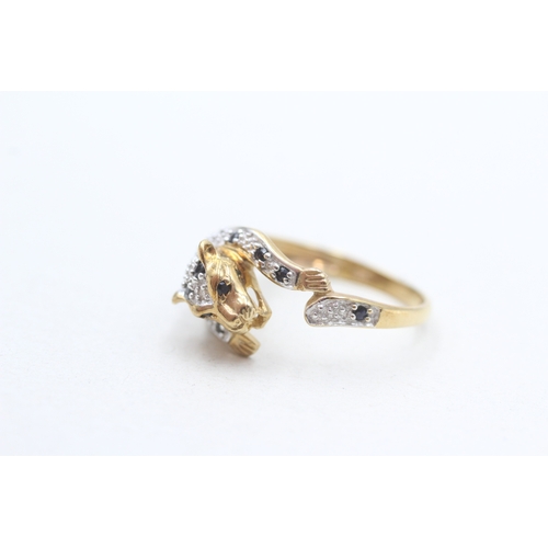 281 - 9ct gold sapphire & diamond leopard dress ring (3g) Size P