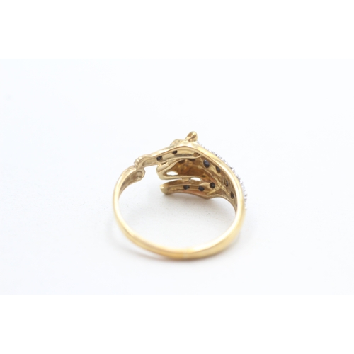281 - 9ct gold sapphire & diamond leopard dress ring (3g) Size P