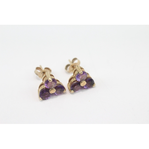 283 - 9ct gold amethyst stud earrings and similar pendant (3.5g)