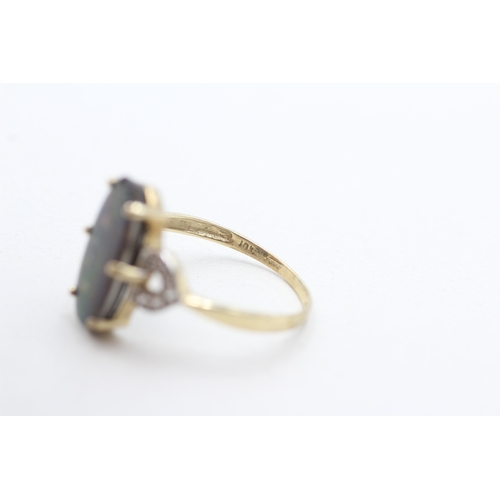 289 - 9ct gold ammolite & white gemstone dress ring (2.2g) Size P 1/2