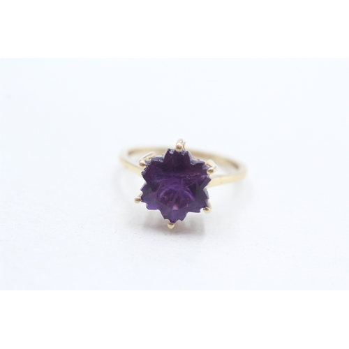 293 - 9ct gold fancy cut amethyst dress ring (2.5g) Size N