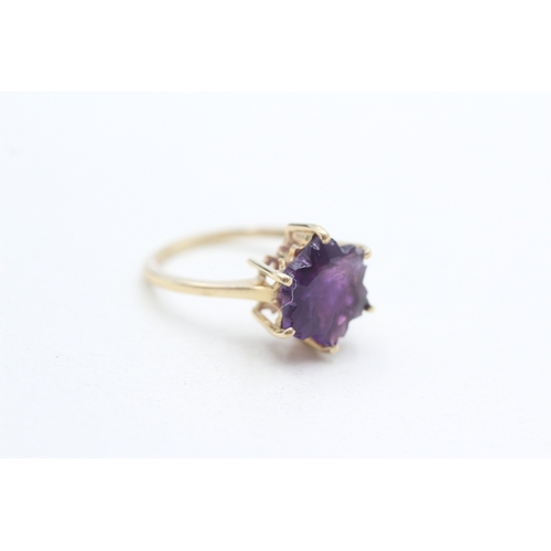 293 - 9ct gold fancy cut amethyst dress ring (2.5g) Size N