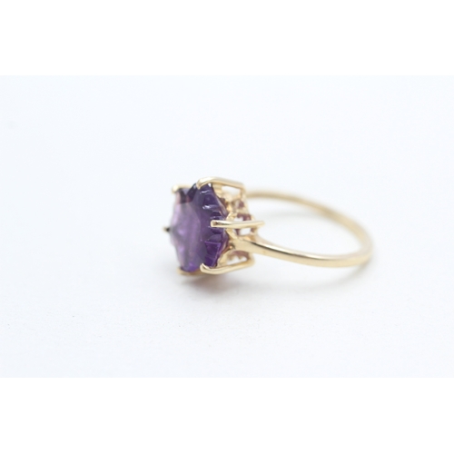 293 - 9ct gold fancy cut amethyst dress ring (2.5g) Size N