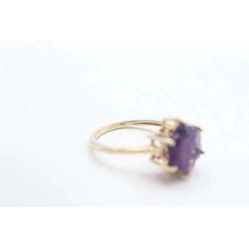 293 - 9ct gold fancy cut amethyst dress ring (2.5g) Size N