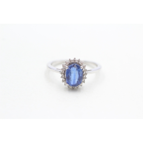 297 - 9ct gold blue & white cluster ring (2.4g) Size N