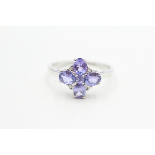 298 - 9ct gold tanzanite & diamond dress ring (2.2g) Size O