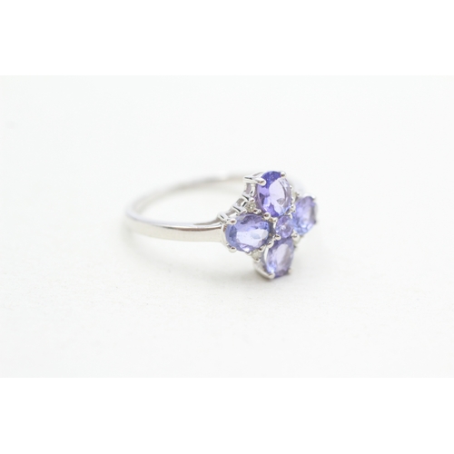 298 - 9ct gold tanzanite & diamond dress ring (2.2g) Size O