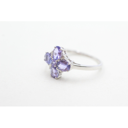 298 - 9ct gold tanzanite & diamond dress ring (2.2g) Size O