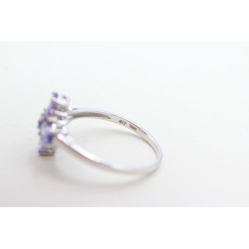 298 - 9ct gold tanzanite & diamond dress ring (2.2g) Size O