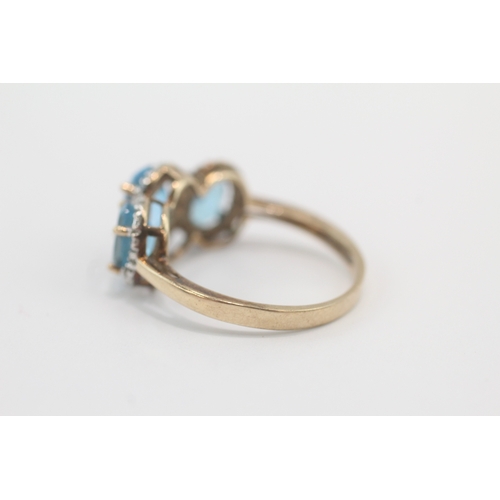 33 - 9ct gold blue topaz & diamond dress ring (4g) Size P
