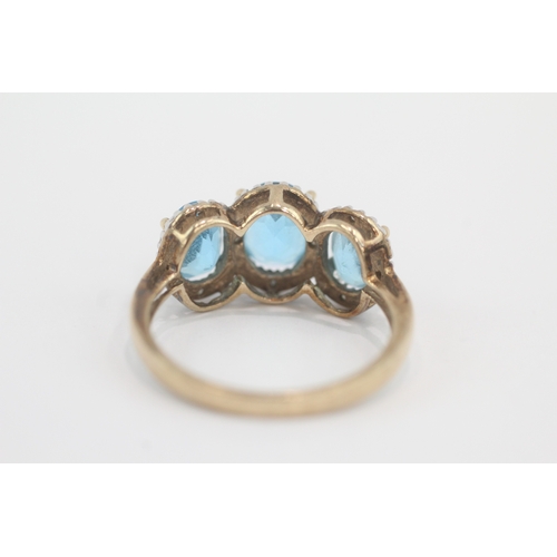33 - 9ct gold blue topaz & diamond dress ring (4g) Size P