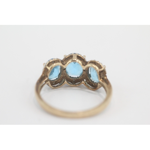 33 - 9ct gold blue topaz & diamond dress ring (4g) Size P