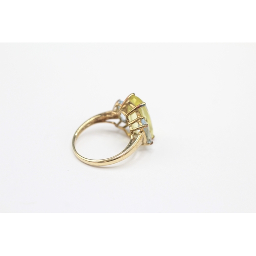 43 - 9ct gold citrine and aquamarine cocktail ring (3.7g) Size N 1/2