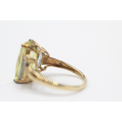 43 - 9ct gold citrine and aquamarine cocktail ring (3.7g) Size N 1/2