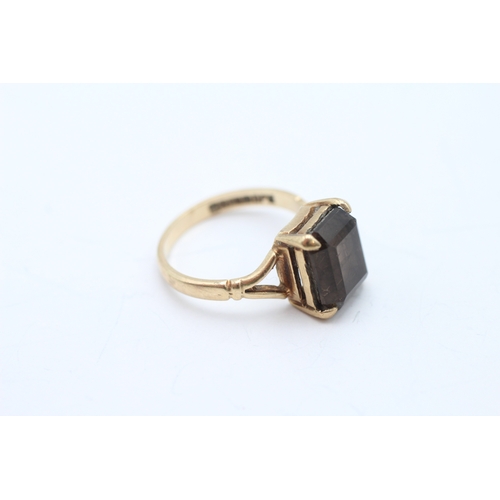 48 - 9ct gold smokey quartz single stone ring (2.5g) Size J
