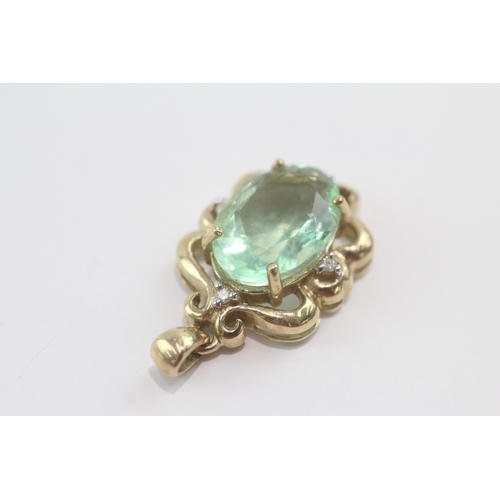 50 - 9ct gold fluorite & diamond pendant (4.6g)