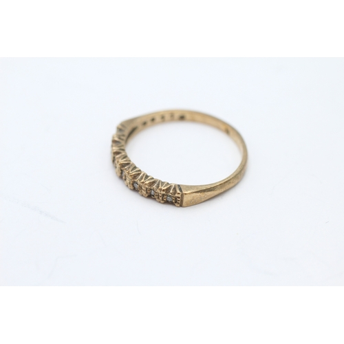 52 - 9ct gold diamond row ring (1.6g) Size M 1/2