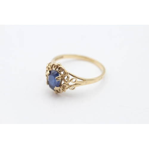 53 - 9ct gold sapphire set ring (1.8g) Size M