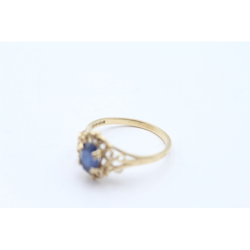 53 - 9ct gold sapphire set ring (1.8g) Size M