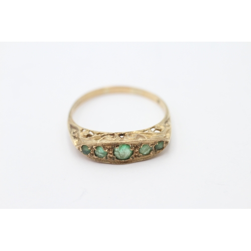 55 - 9ct gold emerald five-stone boat ring (2g) Size P 1/2