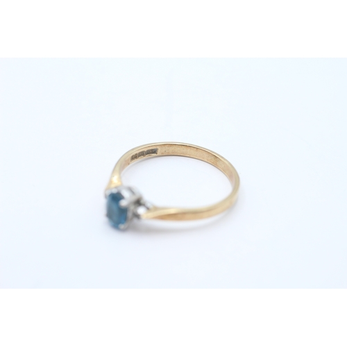 57 - 9ct gold diamond and topaz trilogy ring (1.6g) Size M 1/2