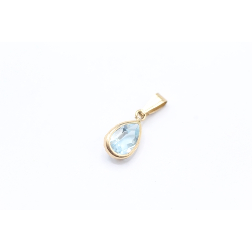 188 - 2 x 9ct gold topaz pendants (1.5g)